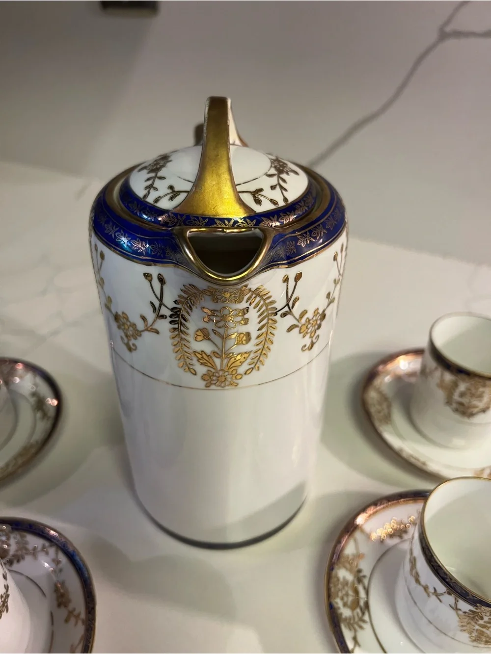 Elegant White Porcelain Coffee/Tea Set with Dark Blue and Gold Trim